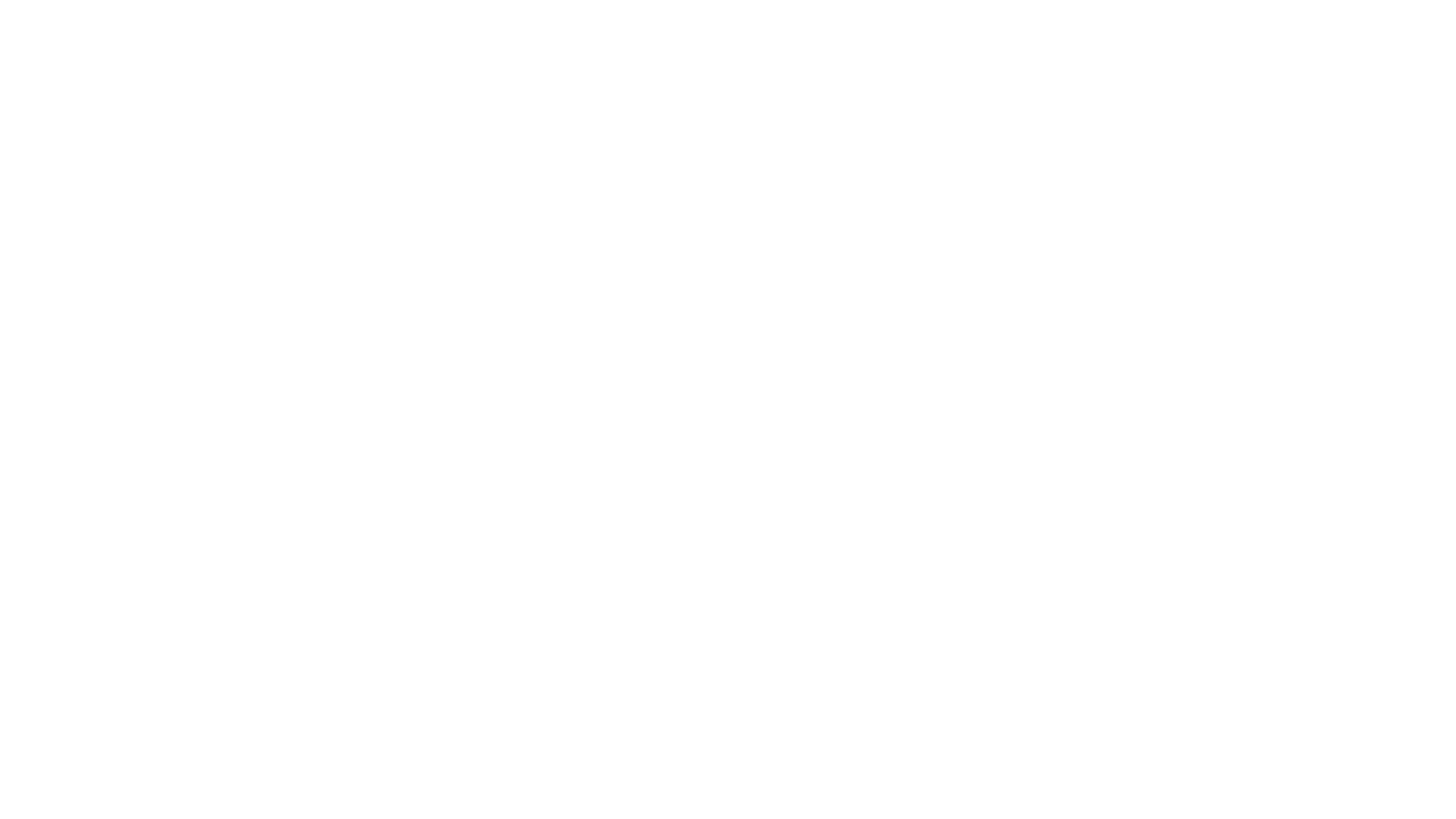 Logoen til viken kommunikasjon i hvitt, 3 overlappende skiver med gradient med en K i midten der det går en strek gjennom K-en som blir til en V, med Viken Kommunikasjon skrevet på siden